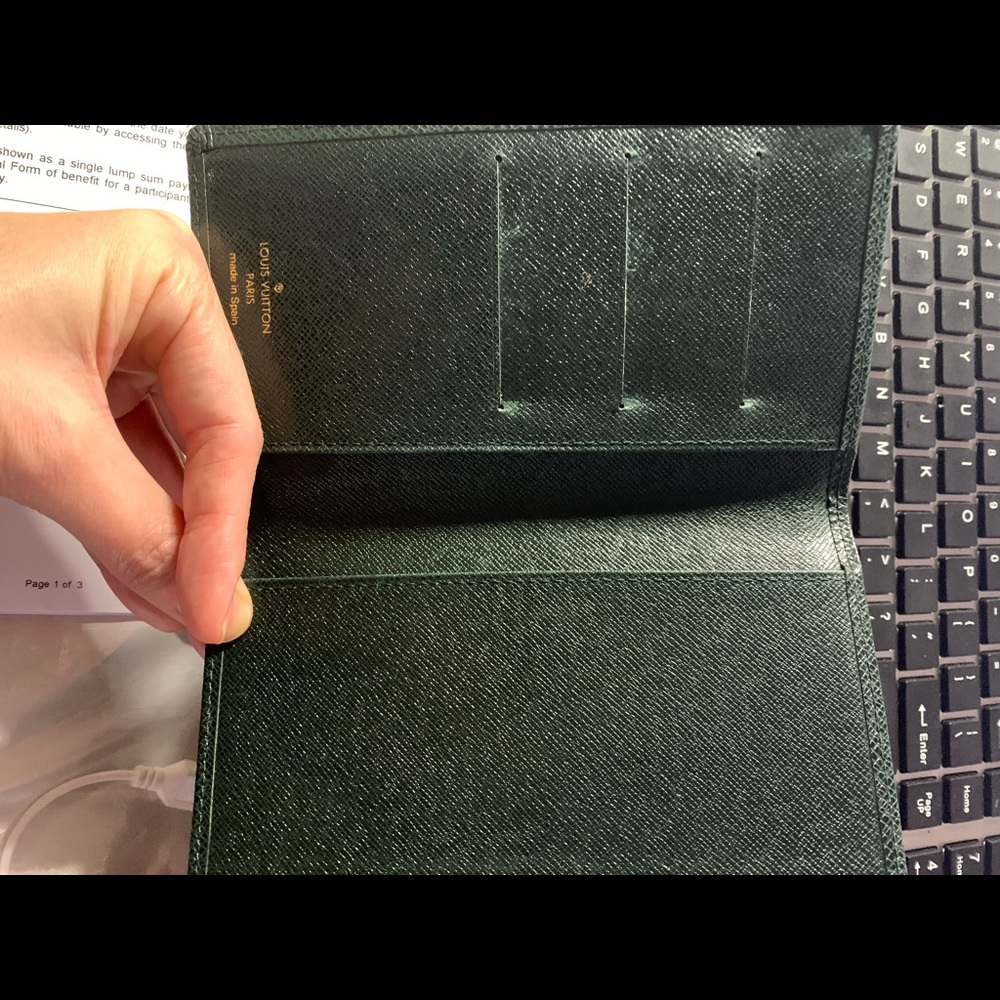 Mint condition Louis Vuitton Taiga checkbook holder